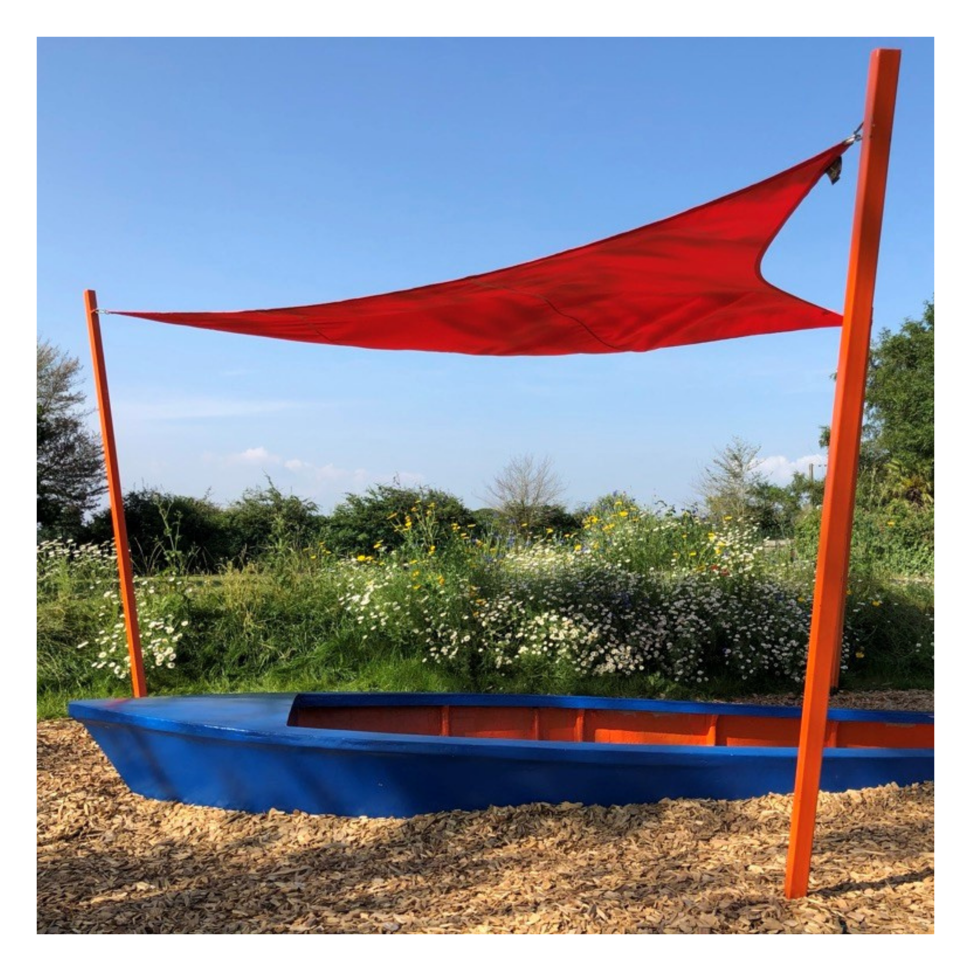 Playground chippings under children's play boat