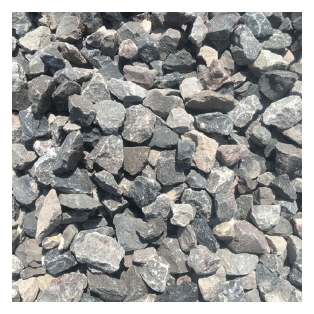 A close-up of Quantock chippings, a natural decorative aggregate with multi-toned stones, perfect for paths, borders, and garden features.