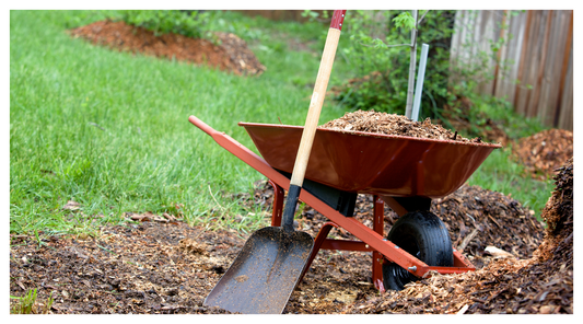 image of playground chip in wheelbarrow