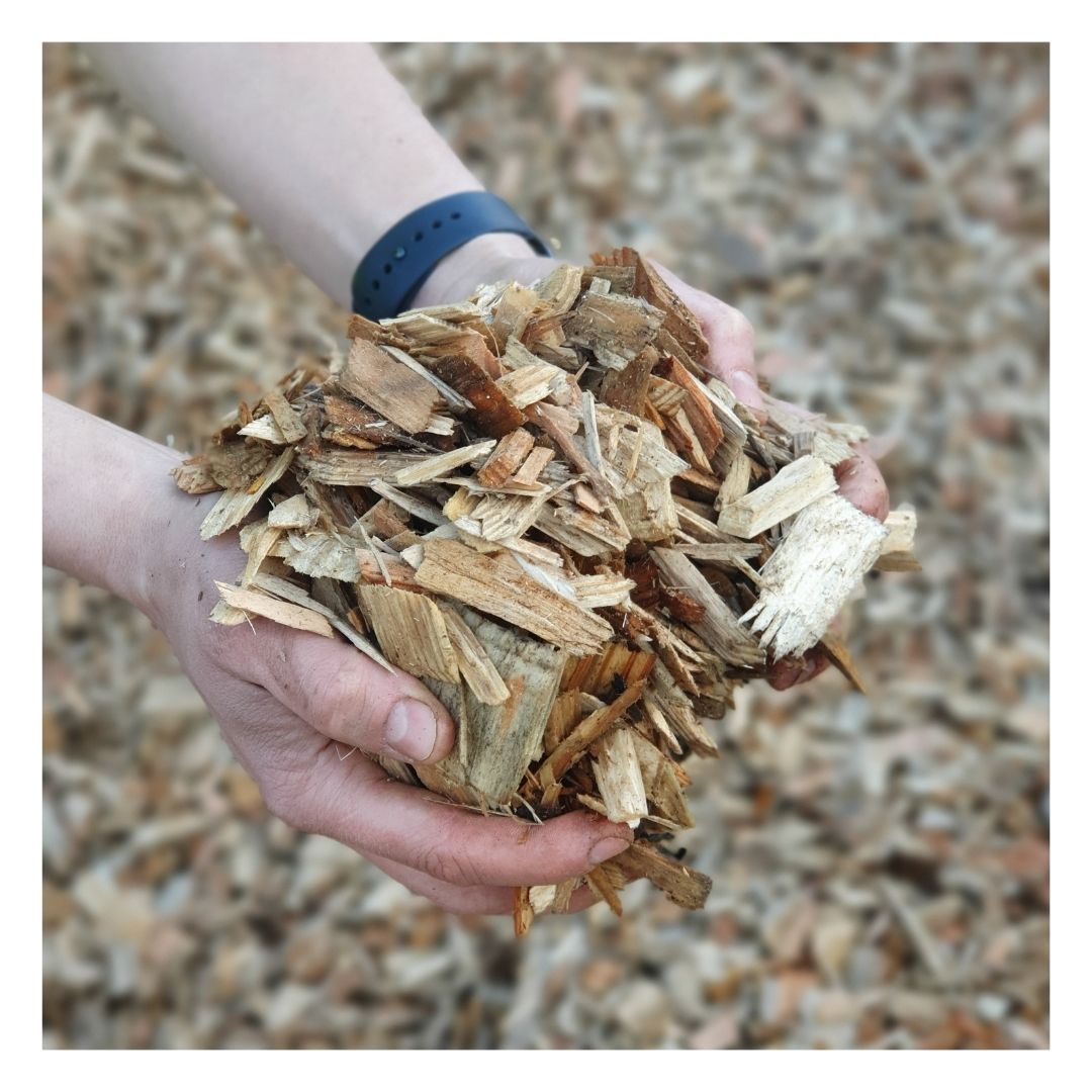Hands holding Eco Garden Path Wood Chippings