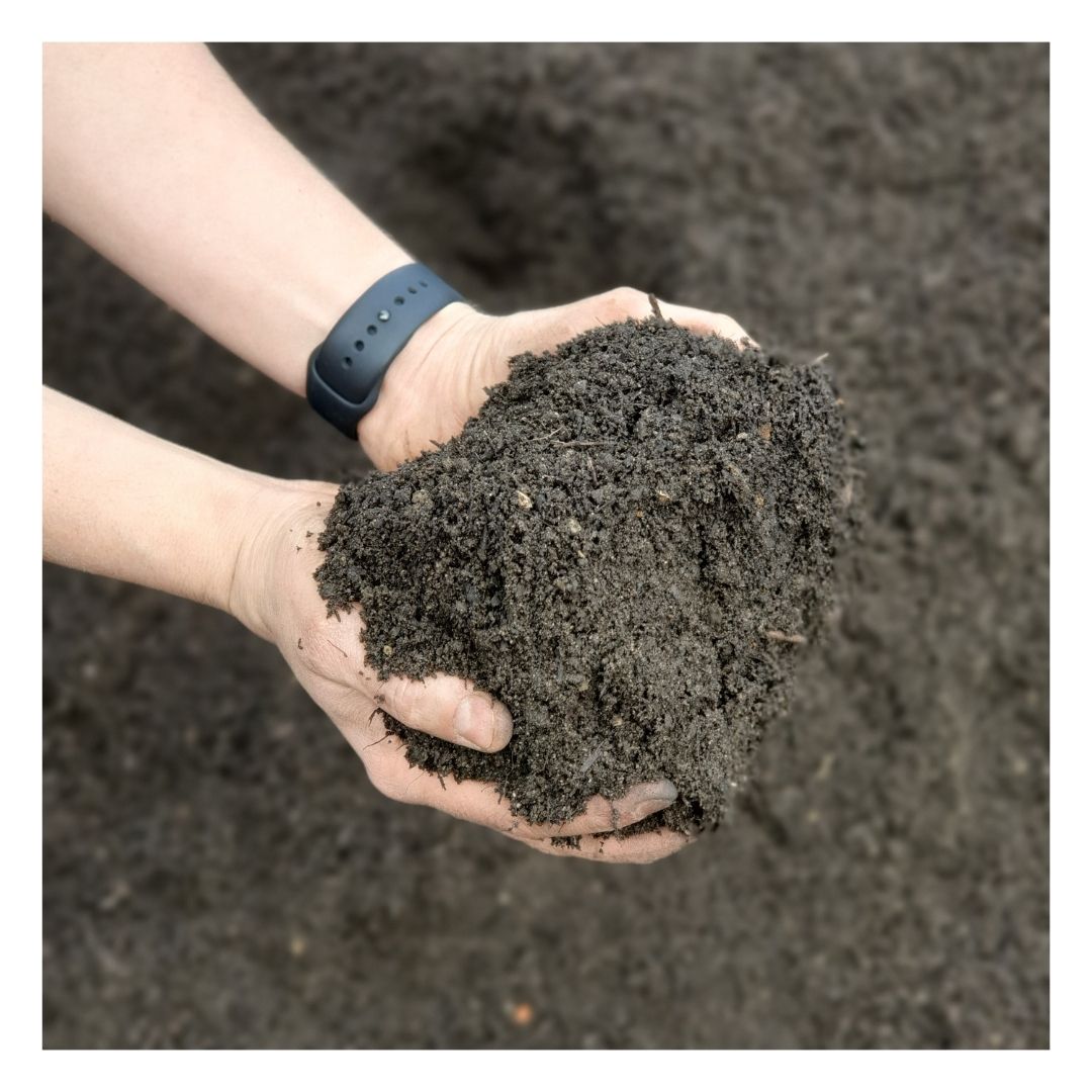 Hands holding Eco Organic Supersoil topsoil