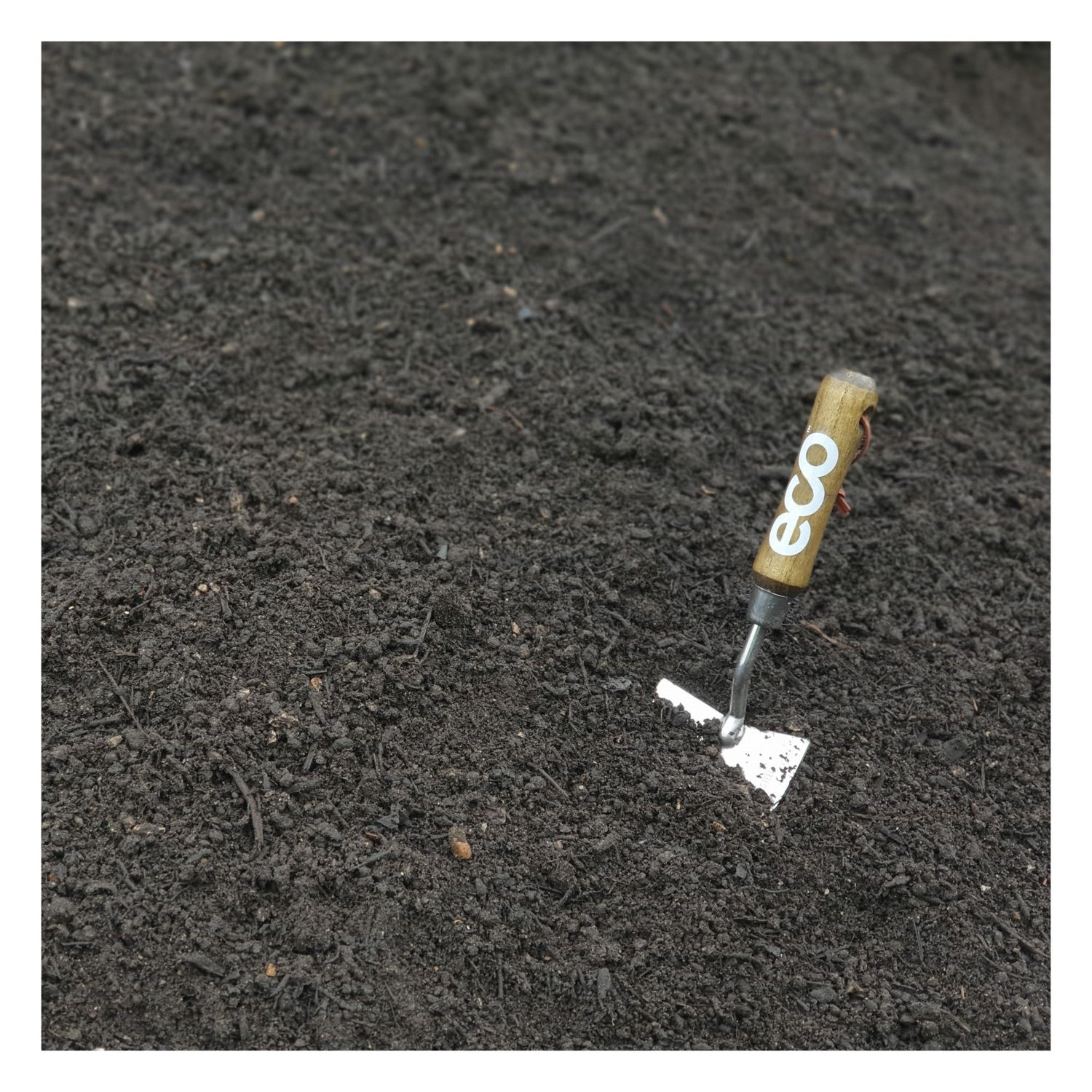 Eco organic topsoil with shovel